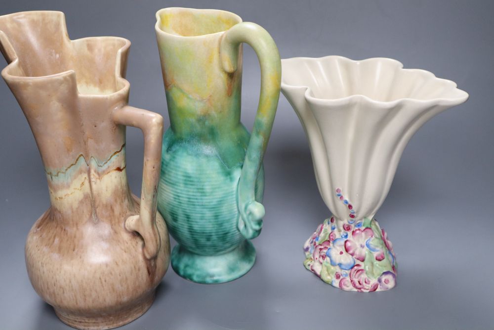 A group of post-war Clarice Cliff including a My Garden vase and jug, Water Lily bowl, 21cm wide, Celtic Harvest jug and two 1930s jugs